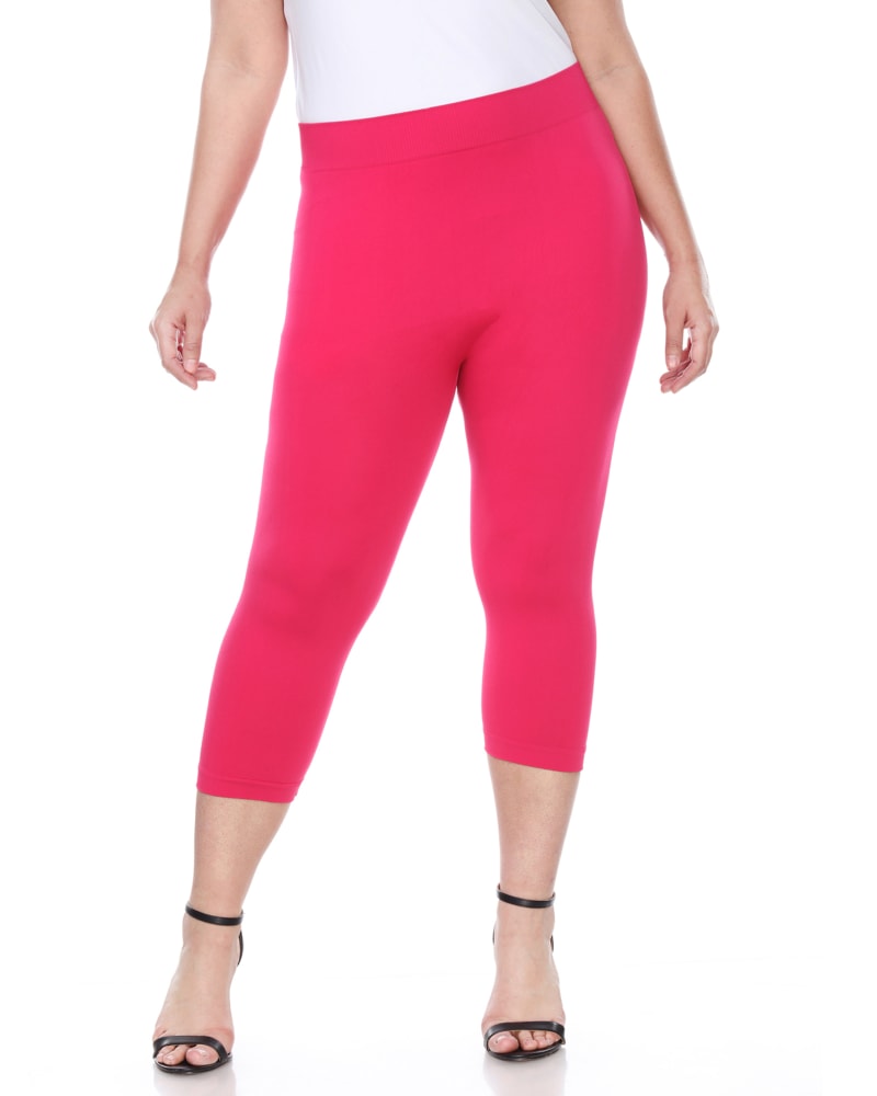 Front of a model wearing a size one-size-fits-all Super Soft Capri Leggings in Fuchsia by White Mark. | dia_product_style_image_id:249363